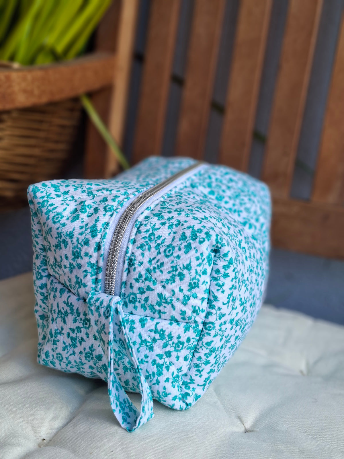 Cosmetic bag with light green flowers