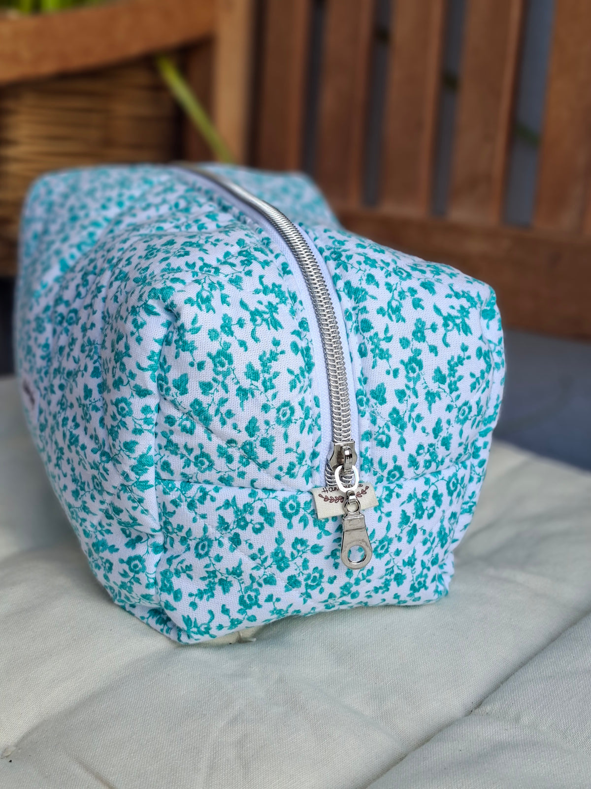 Cosmetic bag with light green flowers