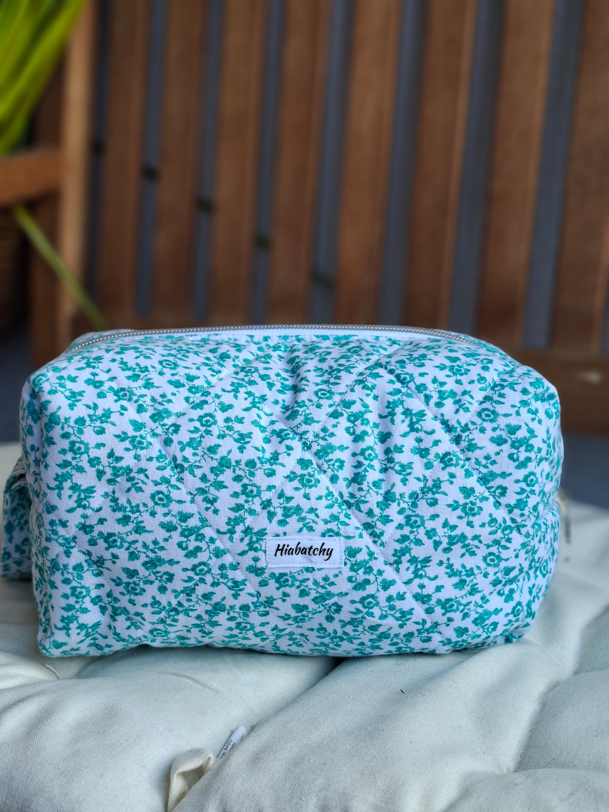 Cosmetic bag with light green flowers