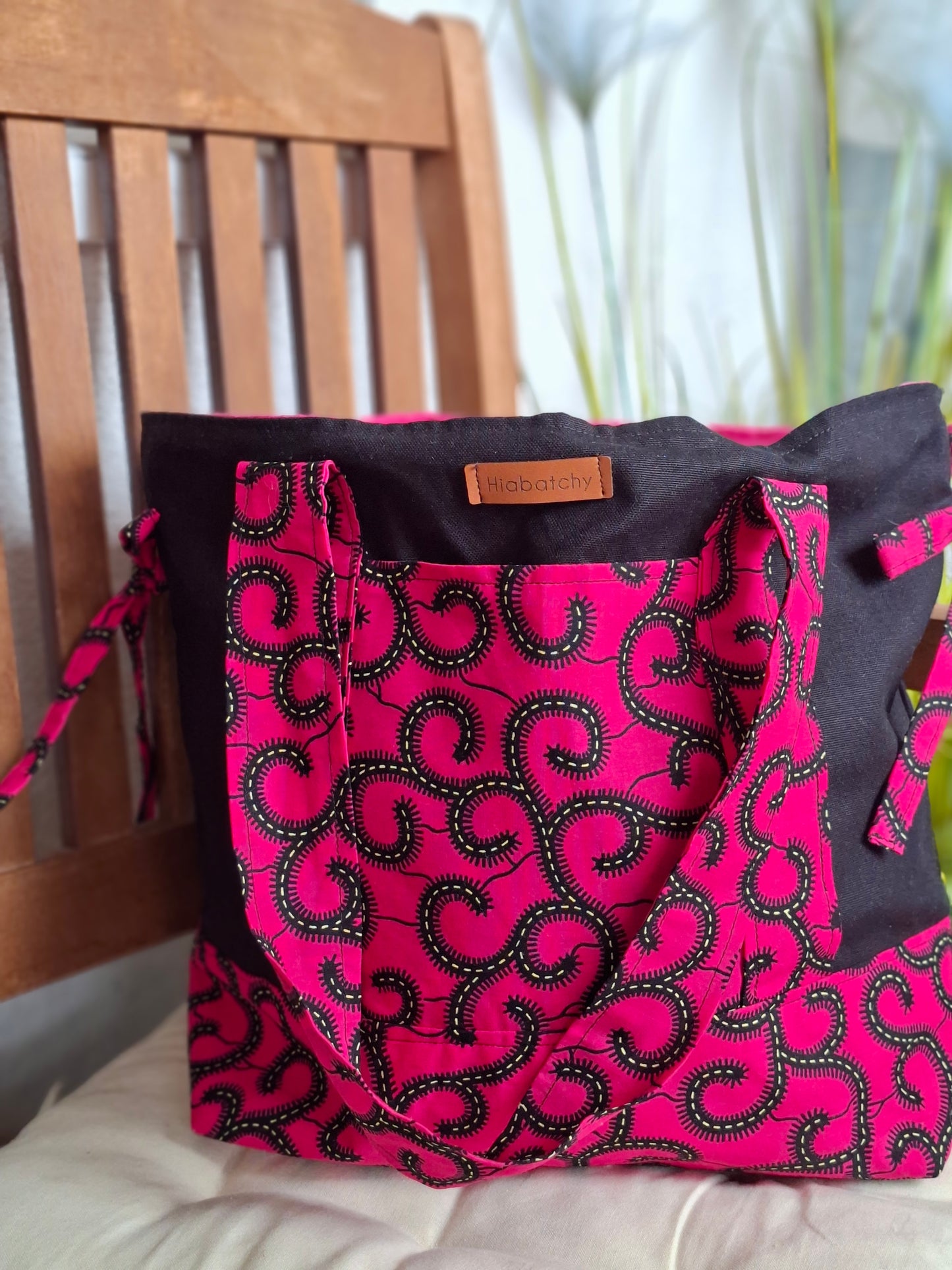 Pink-Schwarz-Handtasche